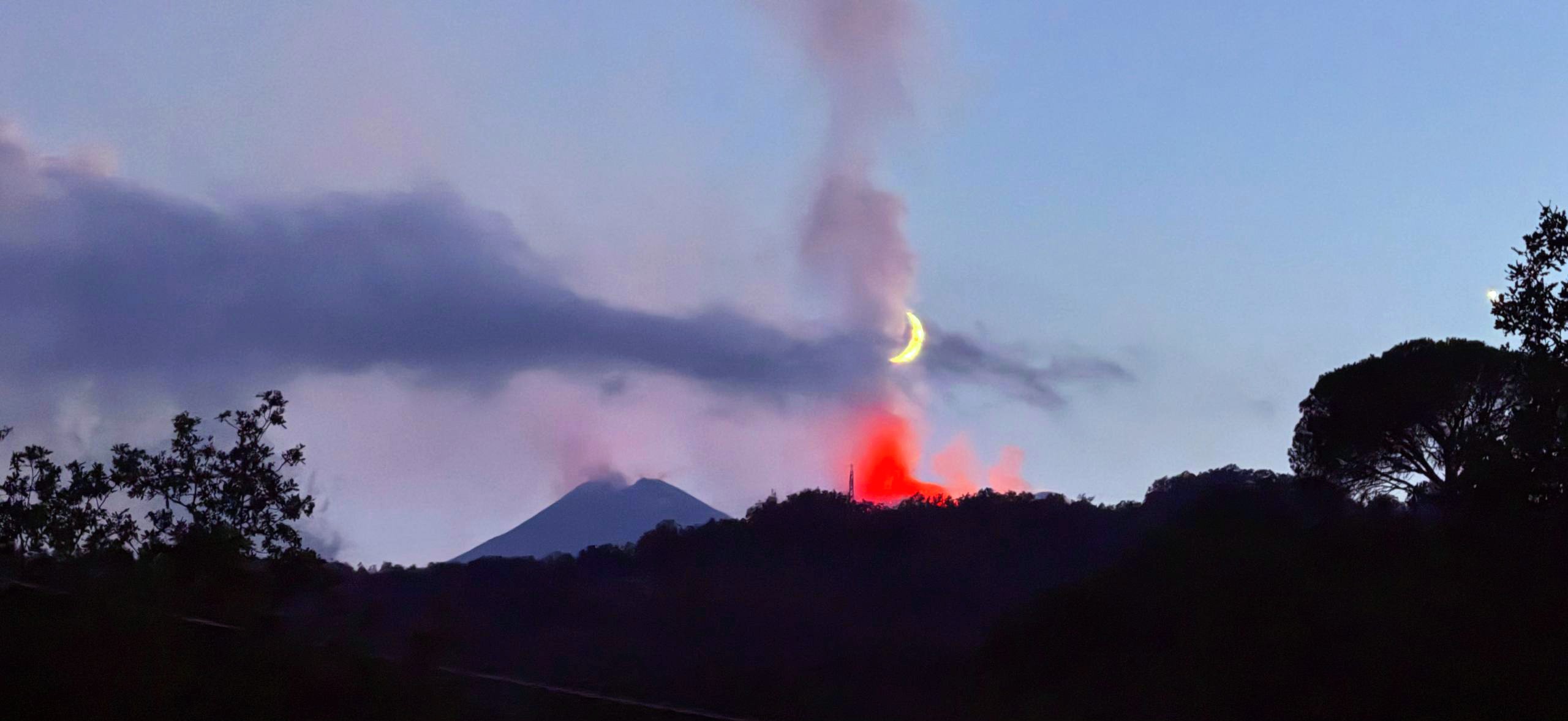 Mount Etna erupting at night in Sicily